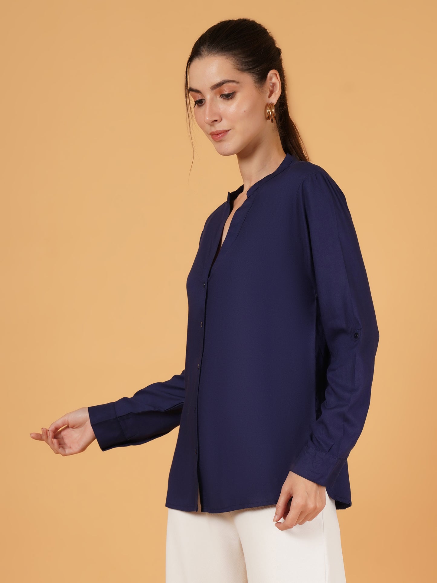 Stay effortlessly stylish with this navy blue oversized cotton shirt. Its solid design and full sleeves make it a versatile piece, perfect for casual wear while offering both comfort and a chic, relaxed fit.