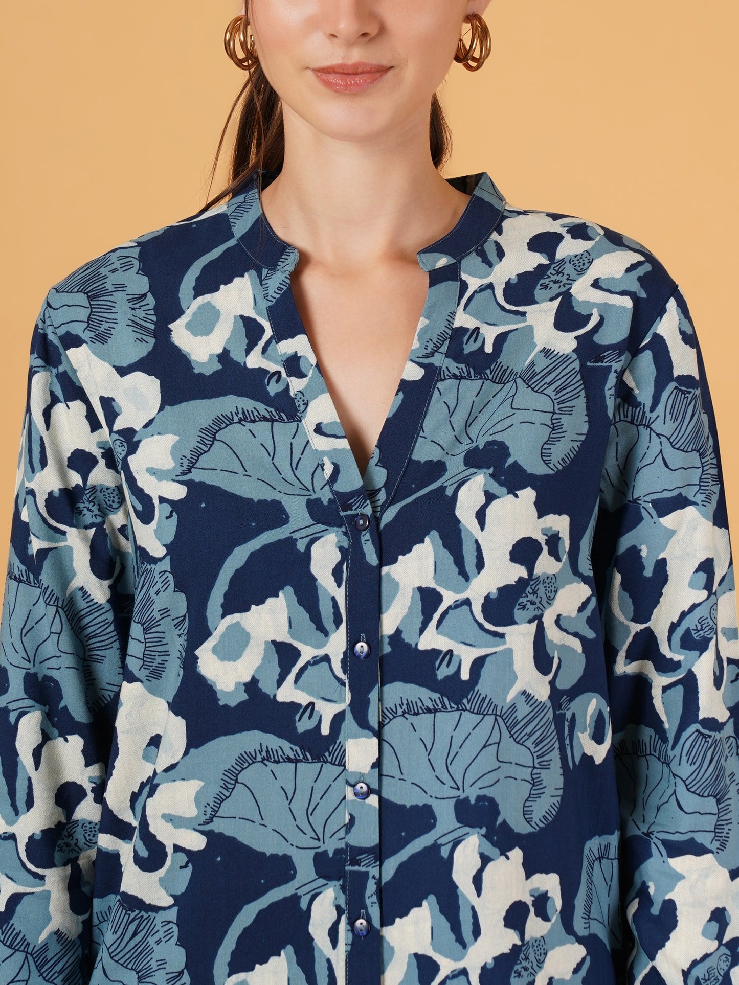 Step out in style with this blue and white abstract print oversized cotton shirt. Designed for comfort and versatility, its full sleeves and relaxed fit make it the perfect addition to your casual wardrobe.