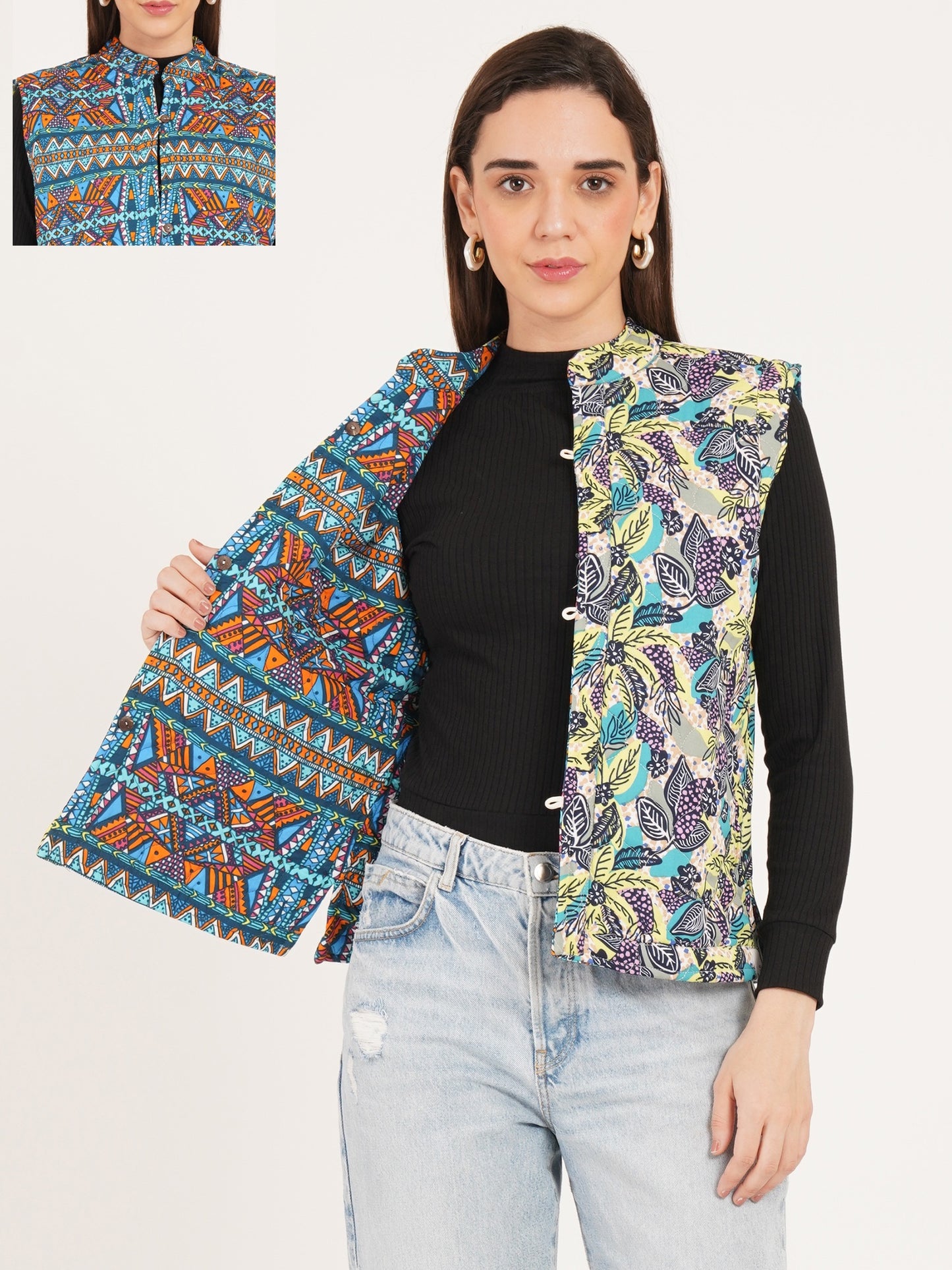 Woman wearing a colorful patterned vest over a black top and light blue jeans, with an inset showing a close-up of the vest.