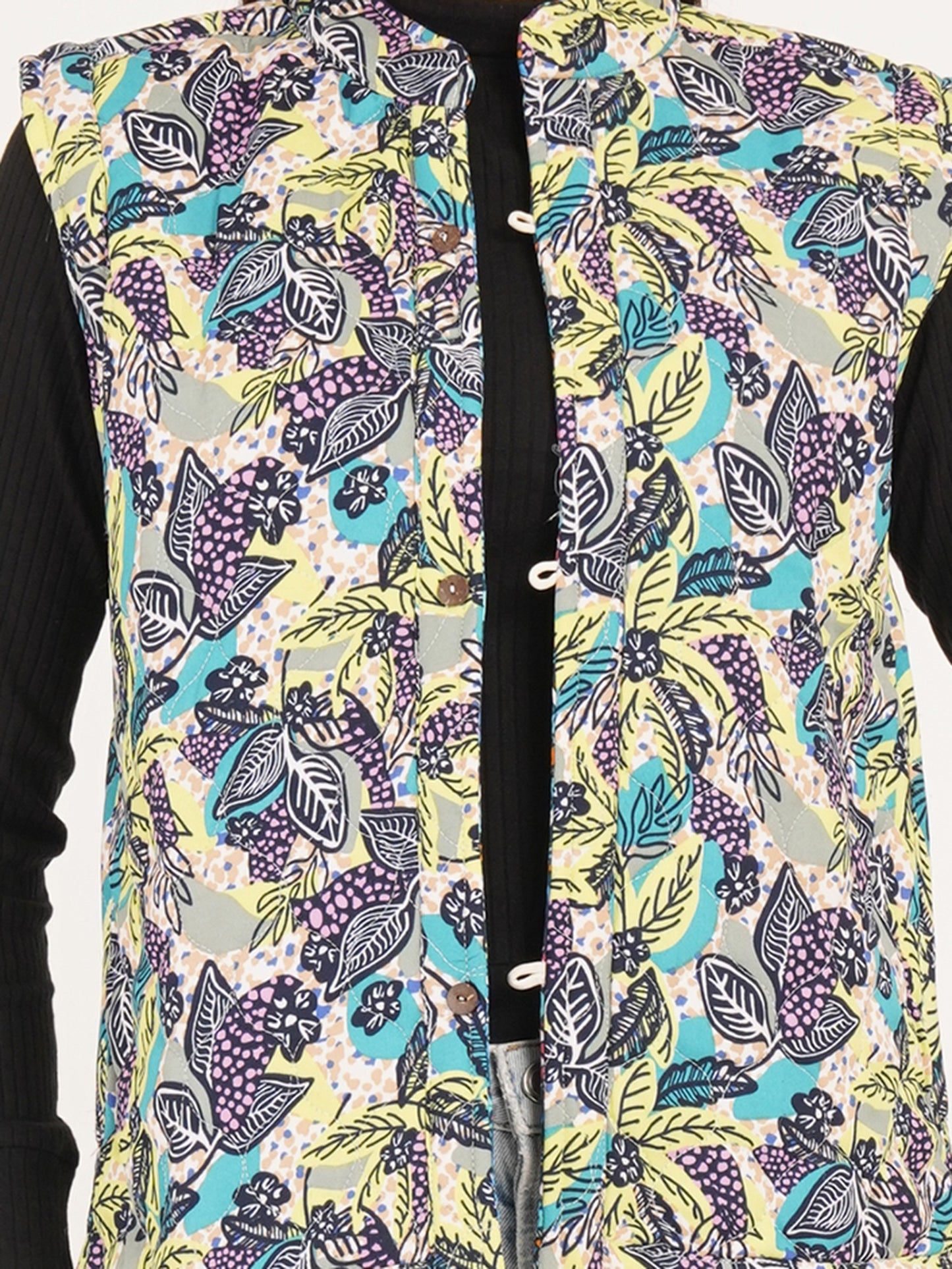 Colorful vest jackets patterned vest with a mix of floral and abstract designs.