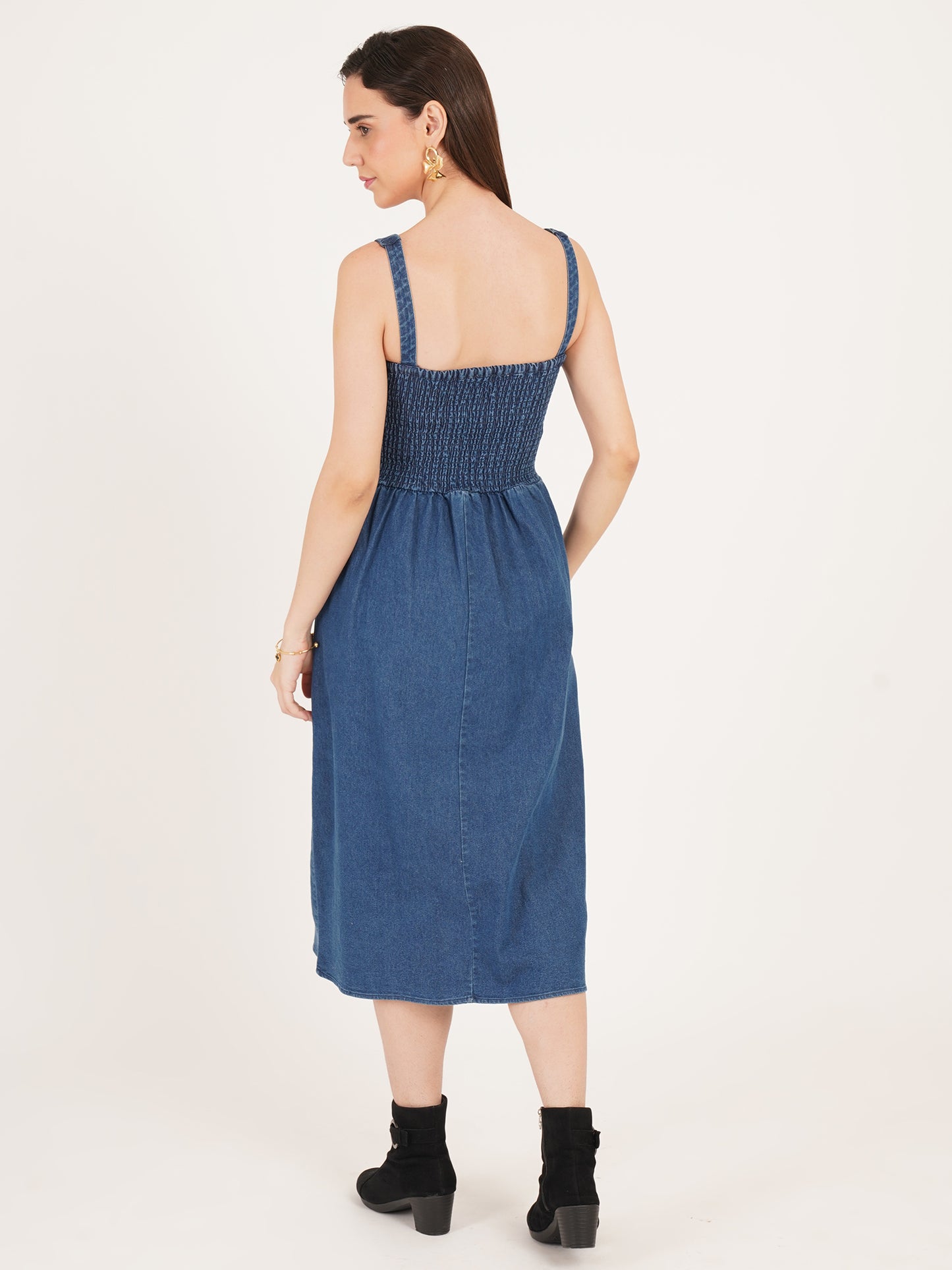 Women look beautiful in 9 impression flared smocked denim dress with boots to complete looks. 