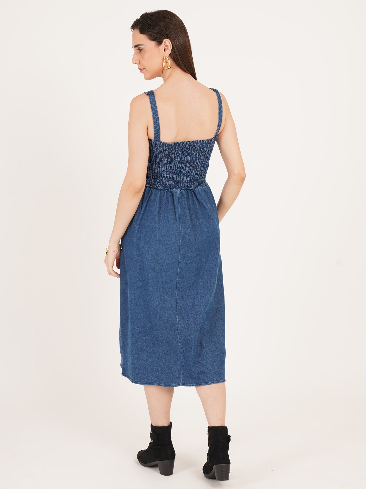 Women look beautiful in 9 impression flared smocked denim dress with boots to complete looks. 