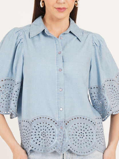 Light blue denim shirt with intricate cut-out sleeves worn by a model 9 Impression