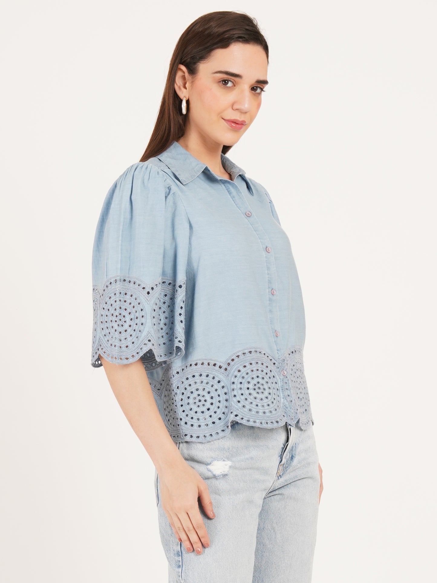 Woman wearing a light blue denim shirt with embroidery short sleeves collared top by 9 Impression