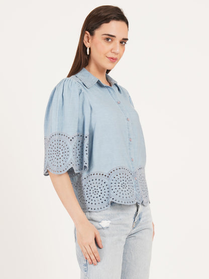 Woman wearing a light blue denim shirt with embroidery short sleeves collared top by 9 Impression