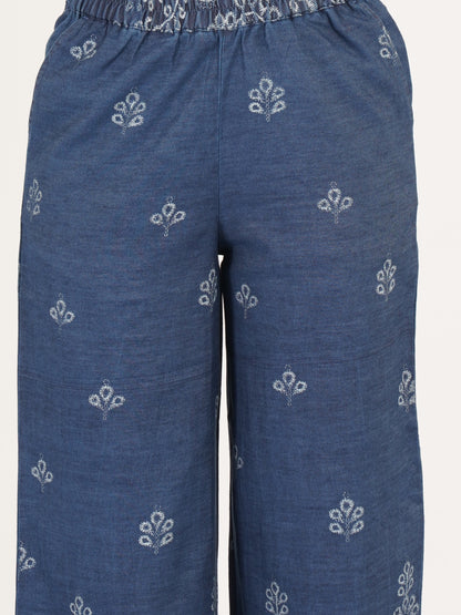 Navy blue palazzo pants with white floral patterns close view by 9 Impression